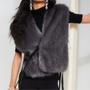 Helmet lang faux fur wrap tie vest